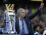 Chelsea's Portuguese manager Jose Mourinho gestures during the presentation of the Premier League trophy after the English Premier League football match between Chelsea and Sunderland at Stamford Bridge in London on May 24, 2015