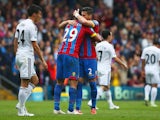 Marouane Chamakh of Crystal Palace celebrates scoring his team's first goal with his team mate Joel Ward during the Barclays Premier League match between Crystal Palace and Swansea City at Selhurst Park on May 24, 2015