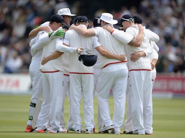England huddle on day two of the First Test with New Zealand on May 22, 2015