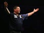 Gary Anderson of Scotland celebrates winning his semi-final match against Dave Chisnall of England during the Betway Premier League at The 02 Arena on May 21, 2015