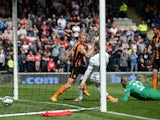 The ball goes into the Manchester United goal past Manchester United's Spanish goalkeeper Víctor Valdes and Manchester United's English striker Wayne Roone but the goal is disallowed for offside during the English Premier League football match between 
