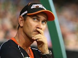 Scorchers coach Justin Langer looks on during the Big Bash League match between the Melbourne Stars and Perth Scorchers at Melbourne Cricket Ground on January 21, 2015