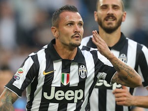Juventus' midfielder Simone Pepe celebrates after scoring a penalty during the Italian Serie A football match Juventus vs Napoli on May 23, 2015