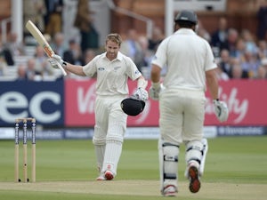 New Zealand's Kane Williamson celebrates reaching his century on the third day of the First Test with England on May 23, 2015