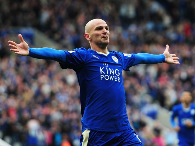 Esteban Cambiasso of Leicester City celebrates scoring his team's fourth goal during the Barclays Premier League match between Leicester City and Queens Park Rangers at The King Power Stadium on May 24, 2015 