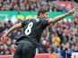 Liverpool's English midfielder Steven Gerrard celebrates scoring their first goal during the English Premier League football match between Stoke City and Liverpool at the Britannia Stadium in Stoke-on-Trent, central England on May 24, 2015