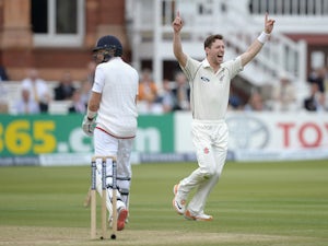Matt Henry of New Zealand celebrates dismissing Joe Root of England during day four of 1st Investec Test match between England and New Zealand at Lord's Cricket Ground on May 24, 2015