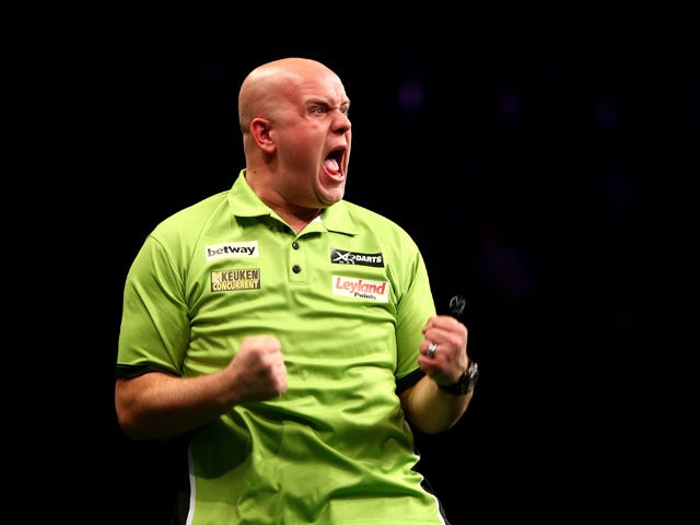Van Gerwen opens with a win after having beer thrown at him at Alexandra Palace