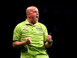 Michael van Gerwen of Holland celebrates winning his semi final match against Raymond van Barneveld of Holland during the Betway Premier League at The 02 Arena on May 21, 2015