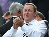 Newcastle United's English owner Mike Ashley applauds as he waits for the kick off in the English Premier League football match between Newcastle United and West Ham United at St James Park, Newcastle-Upon-Tyne, north east England on May 24, 2015