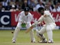 New Zealand batsman Kane Williamson plays a shot in front of England wicket keeper Jos Buttler during the second day of the first cricket Test match between England and New Zealand at Lord's cricket ground in London on May 22, 2015