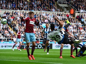 Emmanuel Riviere of Newcastle United makes an overhead kick during the Barclays Premier League match between Newcastle United and West Ham United at St James' Park on May 24, 2015