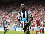 Moussa Sissoko of Newcastle United celebrates scoring his team's first goal during the Barclays Premier League match between Newcastle United and West Ham United at St James' Park on May 24, 2015