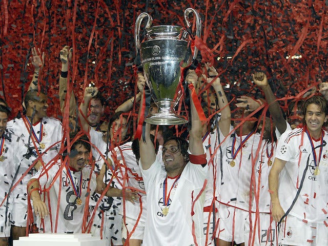Captain Paolo Maldini of Milan lifts the trophy after winning the UEFA Champions League Final match between Juventus FC and AC Milan on May 28, 2003
