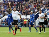 Charlie Austin of QPR celebrates after scoring his team's first goal of the game during the Barclays Premier League match between Leicester City and Queens Park Rangers at The King Power Stadium on May 24, 2015 