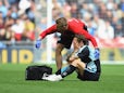Sam Saunders of Wycombe is taken off injured during the Sky Bet League Two Playoff Final match between Southend United and Wycombe Wanderers at Wembley Stadium on May 23, 2015