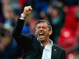 Phil Brown, manager of Southend United celebrates a late equaliser goal in extra-time during the Sky Bet League Two Playoff Final between Southend United and Wycombe Wanderers at Wembley Stadium on May 23, 2015