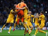 Southend United players celebrate winning during the Sky Bet League Two Playoff Final between Southend United and Wycombe Wanderers at Wembley Stadium on May 23, 2015