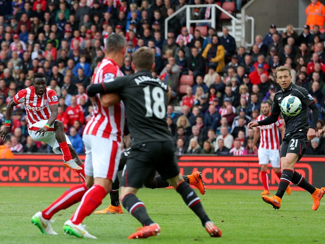 Mame Biram Diouf of Stoke City scores a goal during the Barclays Premier League match between Stoke City and Liverpool at Britannia Stadium on May 24, 2015