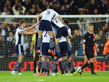 Chris Brunt of West Bromwich Albion (obscured) is mobbed by team mates in celebration as he scores their third goal during the Barclays Premier League match between West Bromwich Albion and Chelsea at The Hawthorns on May 18, 2015