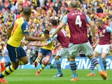 Alexis Sanchez fires home Arsenal's second goal during the FA Cup final against Aston Villa at Wembley on May 30, 2015