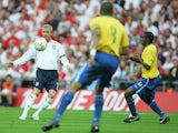 David Beckham of England passes the ball forward during the International Friendly match between England and Brazil at Wembley Stadium on June 1, 2007
