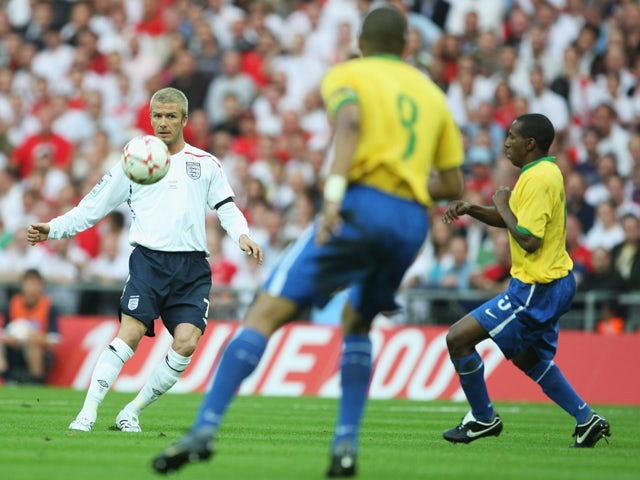 David Beckham of England passes the ball forward during the International Friendly match between England and Brazil at Wembley Stadium on June 1, 2007