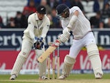 New Zealand's wicket keeper Luke Ronchi catches out England's Mark Wood for 19 rus on the third day of the second cricket test match between England and New Zealand at Headingley in Leeds, northern England, on May 31, 2015