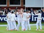 An assortment of England teammates celebrate as they take firm control on day five of the First Test with New Zealand on May 25, 2015