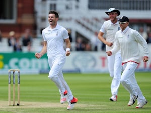 England's James Anderson celebrates taking the wicket of Martin Guptill on day five of the First Test with New Zealand on May 25, 2015