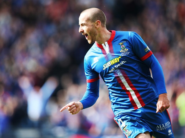 James Vincent of Inverness Caledonian Thistle celebrates after scoring during the William Hill Scottish Cup Final match between Falkirk and Inverness Caledonian Thistle at Hampden Park on May 30, 2015