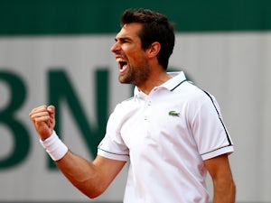 Chardy edges out Isner in epic