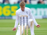 Joe 'Joseph' Root drops to his knees after claiming the wicket of New Zealand's Corey Anderson on May 25, 2015