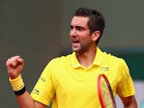 Marin Cilic of Croatia celebrates a point during his Men's Singles match against Andrea Arnaboldi of Italy on day five of the 2015 French Open at Roland Garros on May 28, 2015