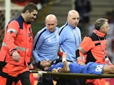 Dnipro's Brazilian forward Matheus (99) is carried off on a stretcher after being injured during the UEFA Europa League final football match between FC Dnipro Dnipropetrovsk and Sevilla FC at the Narodowy stadium in Warsaw, Poland on May 27, 2015