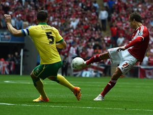 Middlesbrough's Belgian striker Jelle Vossen hits a shot that hits the Norwich City crossbar during the English Championship play off final football match between Middlesbrough and Norwich City at Wembley Stadium in London on May 25, 2015