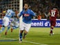 Napoli's forward from Argentina and France Gonzalo Higuain celebrates after scoring during the Italian Serie A football match SSC Napoli vs SS Lazio on May 31, 2015
