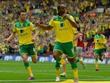 Norwich City's English striker Cameron Jerome celebrates scoring the opening goal during the English Championship play off final football match between Middlesbrough and Norwich City at Wembley Stadium in London on May 25, 2015