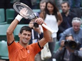 Serbia's Novak Djokovic celebrates after winning his match against Luxemburg's Gilles Muller during the men's second round of the Roland Garros 2015 French Tennis Open in Paris on May 28, 2015