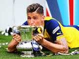 Olivier Giroud of Arsenal kisses the FA Cup at Wembley on May 30, 2015