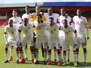 Qatar players line up prior to the International friendly match between Northern Ireland and Qatar at The Alexandra Stadium on May 31, 2015