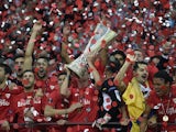 Sevilla players celebarte with throphy after the UEFA Europa League final football match between FC Dnipro Dnipropetrovsk and Sevilla FC at the Narodowy stadium in Warsaw, Poland on May 27, 2015