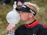 Soren Kjeldsen of Denmark kisses the trophy after winning the Irish open at the Royal County Down Golf Club in Newcastle in Northern Ireland on May 31, 2015