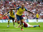 Half-Time Report: Walcott fires Arsenal ahead