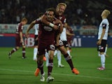 Emiliano Moretti of Torino FC celebrates his goal with team-mate Kamil Glik during the Serie A match between Torino FC and AC Cesena at Stadio Olimpico di Torino on May 31, 2015