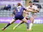 Willie Tonga (R) of Catalans Dragons tackled by Aaron Murphy of Huddersfield Giants during the Super League match between Catalans Dragons and Huddersfield Giants at St James' Park on May 31, 2015
