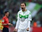 Wolfsburg's Dutch striker Bas Dost celebrates scoring during the German Cup DFB Pokal final football match between BVB Borussia Dortmund and VfL Wolfsburg at the Olympic Stadium in Berlin on May 30, 2015
