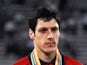 Alan Wells of Great Britain listens to the national anthem on the podium after winning the men's 100m final 25 July 1980