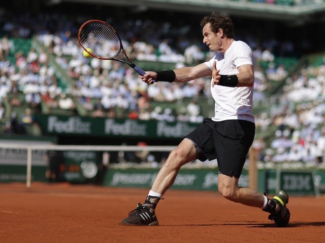 Andy Murray plays a backhand stroke during the French Open semi-final against Novak Djokovic at Roland Garros on June 5, 2015