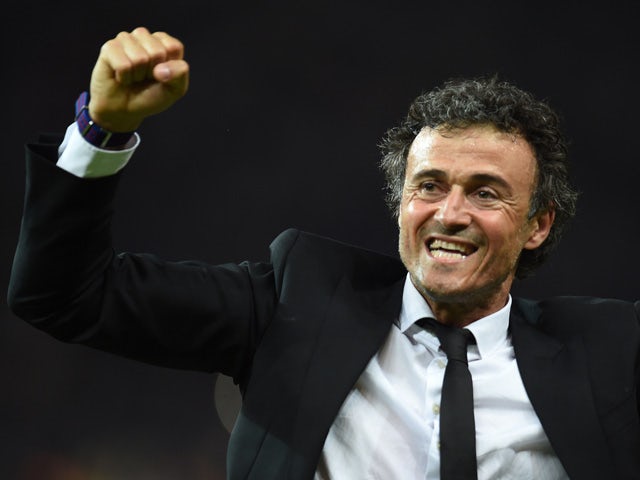 Barcelona's coach Luis Enrique celebrates after the UEFA Champions League Final football match between Juventus and FC Barcelona at the Olympic Stadium in Berlin on June 6, 2015